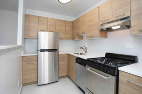 Washington apartment for rent - kitchen with light wood cabinets and updated appliances