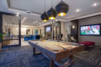 Clubroom with kitchen and fireplace