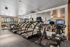 Denver apartment for rent - A gym with treadmills and exercise bikes.