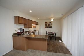 Shawnee apartment for rent - a view of a kitchen and dining area in a apartment