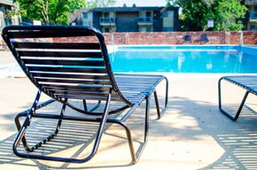 Mission apartment for rent - a lounge chair next to a swimming pool