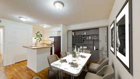 Lee's Summit apartment for rent - a dining room and kitchen with a table and chairs