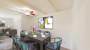 Lee's Summit apartment for rent - a dining room with a table and chairs and a ceiling fan