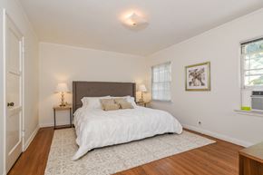 Los Angeles apartment for rent - a bedroom with a bed and a rug
