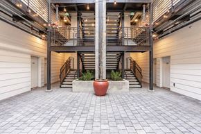 Seattle apartment for rent - the lobby of a large building with stairs