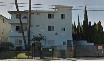Wilmington apartment for rent - a white building with a fence in front of it