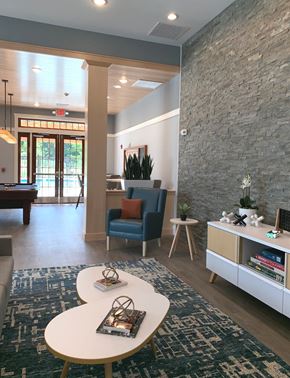 Merrimack apartment for rent - a lobby with a table and chairs and a pool table