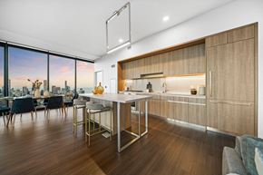 Chicago apartment for rent - A modern kitchen with a dining table and chairs.