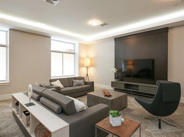 Elmsford apartment for rent - a living room with a couch and a television