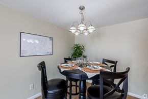 Rocky Hill apartment for rent - a dining room with a table and chairs and a chandelier
