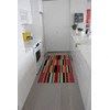 Cleveland apartment for rent - A hallway with a striped rug on the floor.