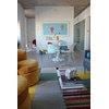 Cleveland apartment for rent - A living room with a couch and a painting on the wall.