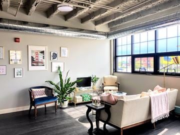 South Bend apartment for rent - a living room with a couch and chairs and a tv