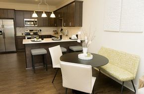 Latham apartment for rent - a dining room and kitchen with a table and chairs