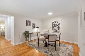 Denver apartment for rent - A dining room with a table and chairs.