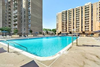 Swimming pool with relaxing sundecks