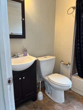 Lakewood house for rent - a small bathroom with a toilet and a sink