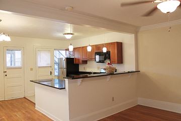 Cleveland Heights apartment for rent - a kitchen with a counter top and a refrigerator
