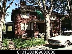 Homestead apartment for rent - A white car is parked in front of a house.