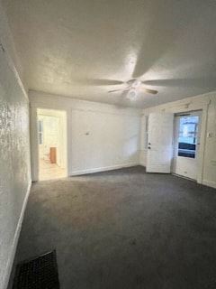 Homestead apartment for rent - an empty living room with a ceiling fan