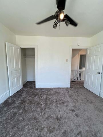 Munhall house for rent - a living room with carpet and a ceiling fan