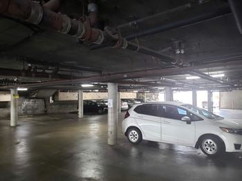 Gated subterranean parking garage w/reserved parking