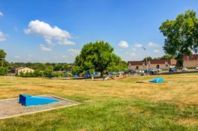 Norristown apartment for rent - a park with several trampolines in the grass