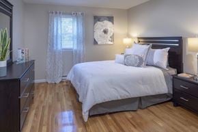 New Milford apartment for rent - a bedroom with a bed and a window