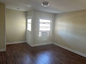 Talladega apartment for rent - A room with a door and a window.