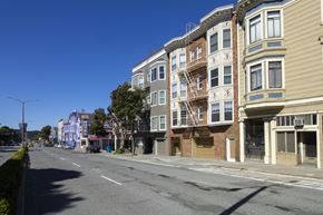 San Francisco apartment for rent - A street with buildings on both sides and no people.