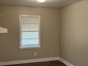 Talladega house for rent - A room with a window and a light switch on the wall.