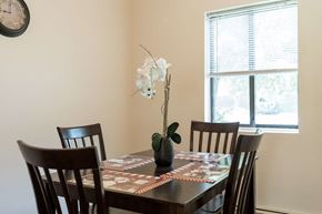 Philadelphia apartment for rent - a dining room with a table and chairs and a window