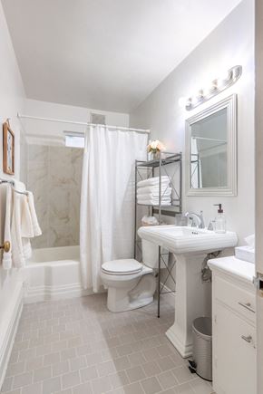 Portland apartment for rent - a small bathroom with a sink toilet and shower