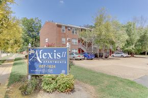 Norfolk apartment for rent - a leasing sign in front of an apartment building