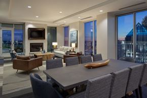 Charlotte apartment for rent - A modern dining room with a large table and chairs.