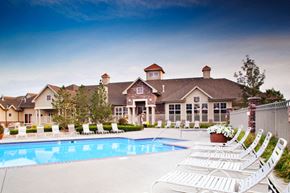 Lavista apartment for rent - A large house with a pool in front.
