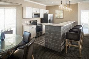 Omaha apartment for rent - a kitchen and dining room with a table and chairs