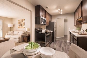 Omaha apartment for rent - our apartments offer a kitchen and living room with a table