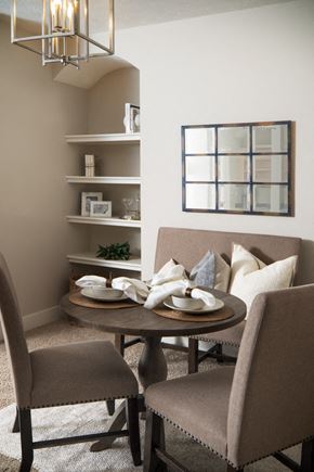 Omaha apartment for rent - A dining room with a round table and chairs.