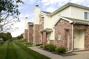 Omaha apartment for rent - a brick and with a sidewalk and grass