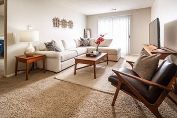 Lincoln apartment for rent - a living room with a couch and a tv