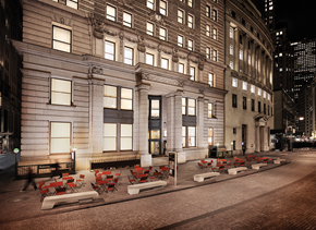 New York apartment for rent - an outdoor seating area of a building in the city at night