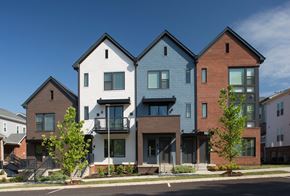 Nashville triplex for rent - A row of houses with different colored exteriors.