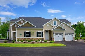 Albany apartment for rent - A two-story house with a garage on the right side.