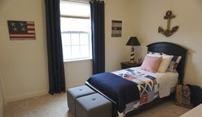 Albany apartment for rent - a bedroom with a bed and an and a window