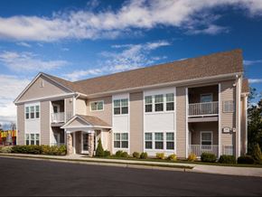 Middletown apartment for rent - a large apartment building with a street in front of it