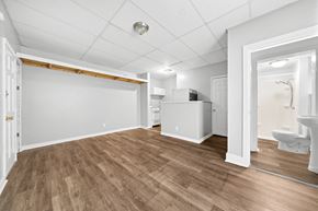 Philadelphia apartment for rent - the living room and dining room of a renovated house with wood flooring