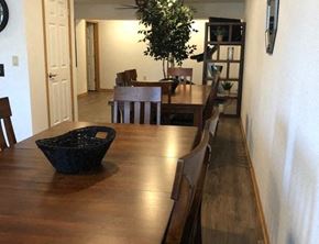 North Hudson apartment for rent - a dining room with a wooden table and chairs