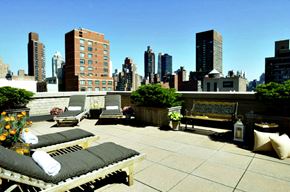New York apartment for rent - a rooftop patio with a view of the city