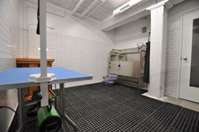 Lowell apartment for rent - a room in a gym with a table and a sink